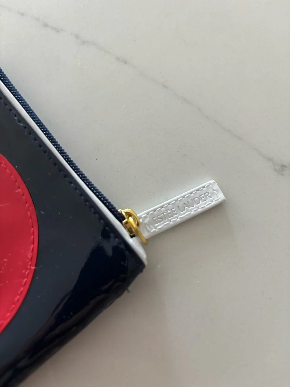 Estee Lauder Blue Patent Cosmetic Pouch with Red Circle